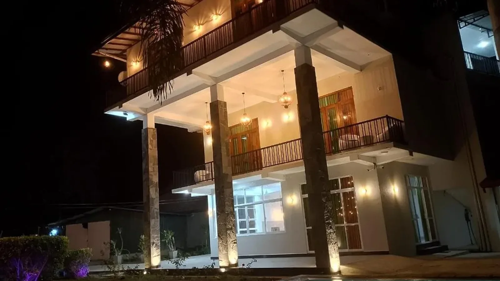 Malindu Yala Gate hotel and pool at night