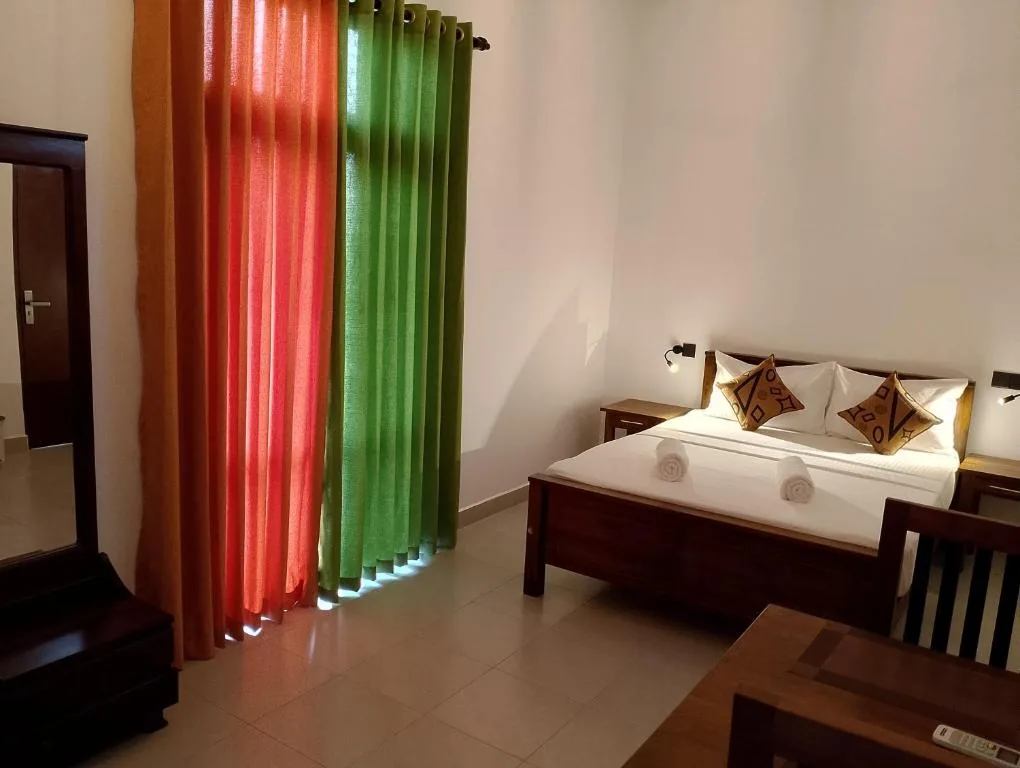 Room interior with curtains and bed