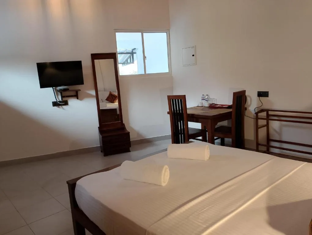 Room view with TV and seating area