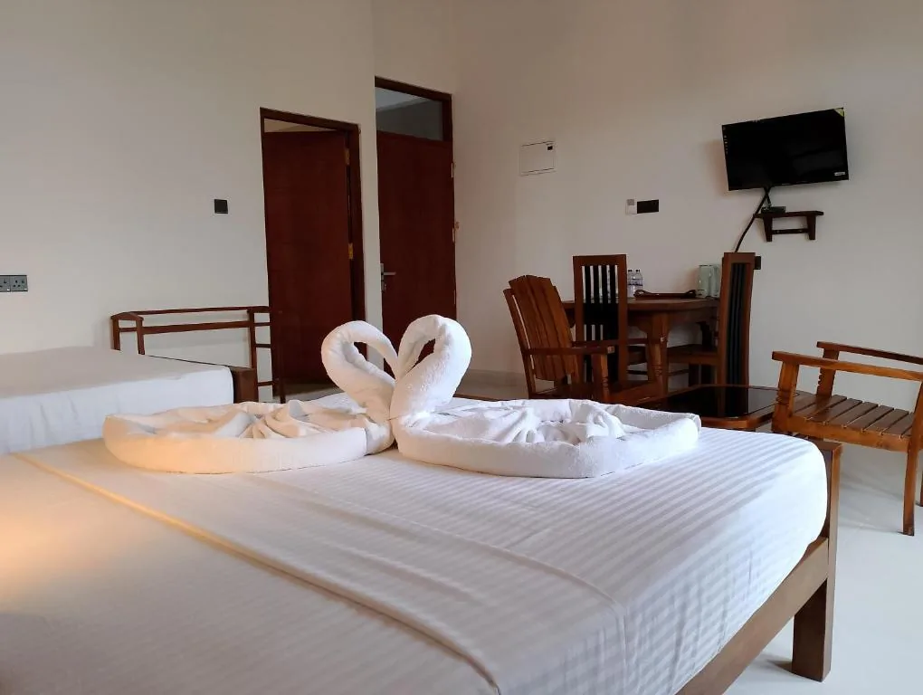 Room view with towel decor and TV area