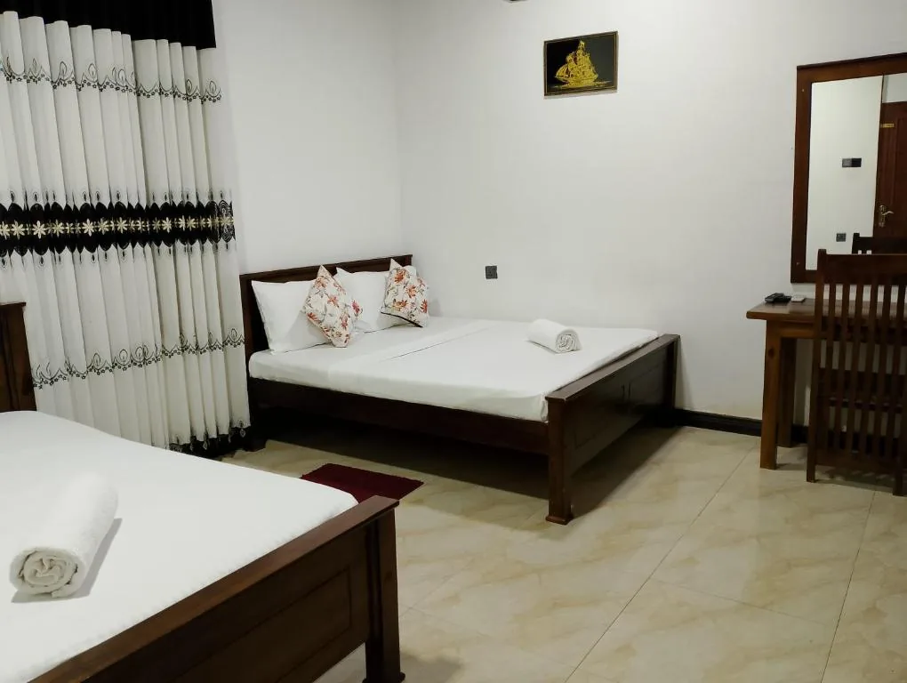 Alternative room angle of the Deluxe Triple Room
