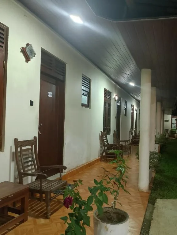 Outdoor corridor and seating area at Malindu Yala Gate